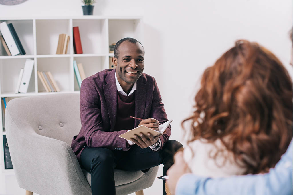 clinician talking to couple