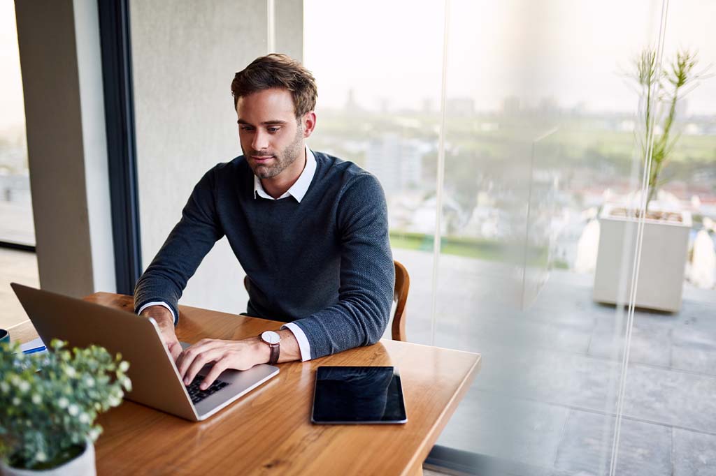 man working on laptop