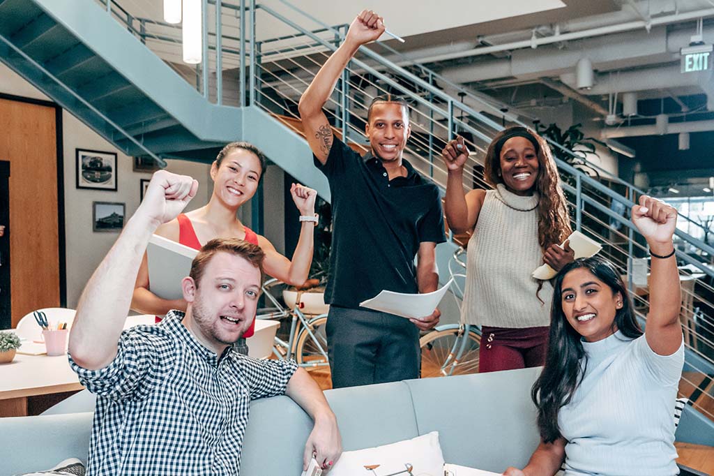 group of students cheering