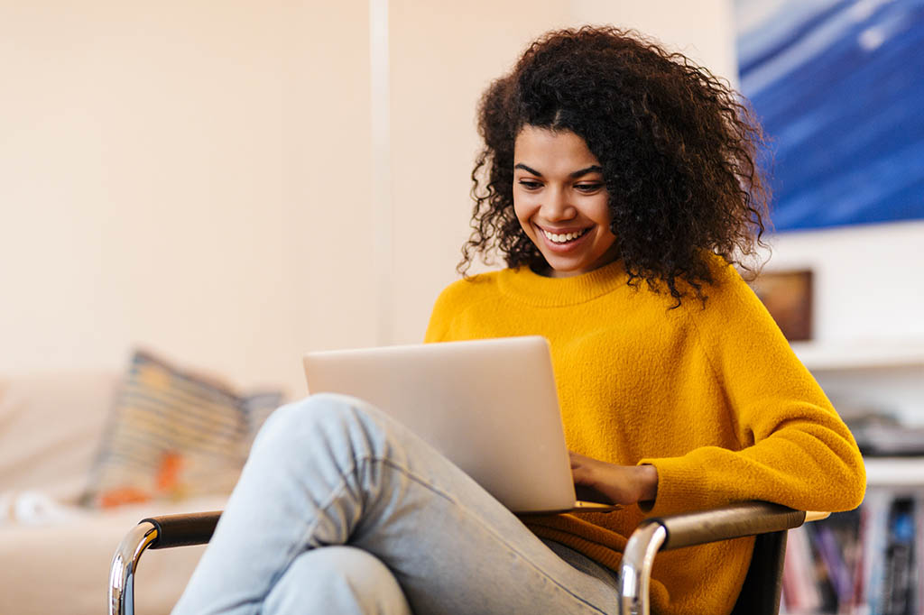 patient reviewing treatment plan on laptop