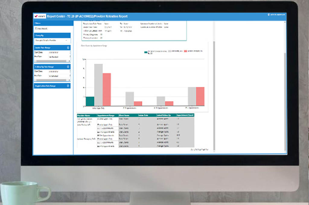 Computer with Valant EHR Software on screen