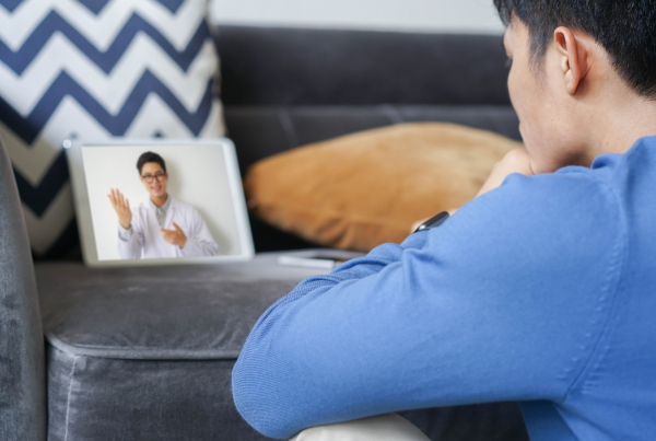 therapist works with client over telehealth