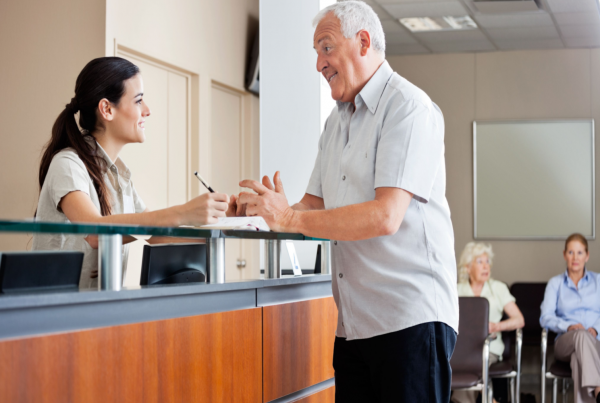 patient discusses automated appointment reminders cadence at front desk