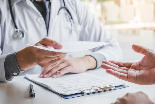 clinician reviews DEA's new telemedicine rules with patient