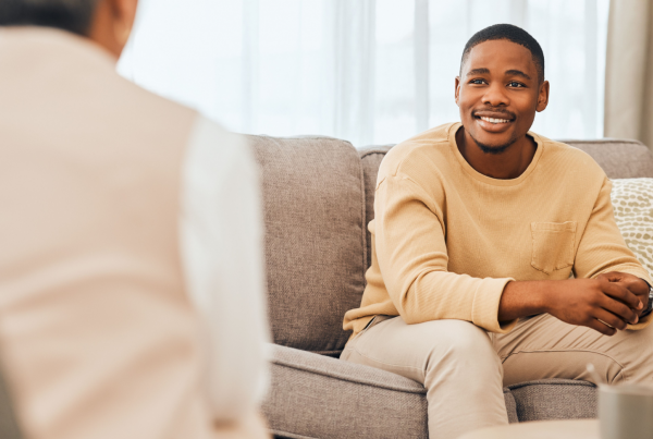 Therapist discusses EHR transition plan with a patient